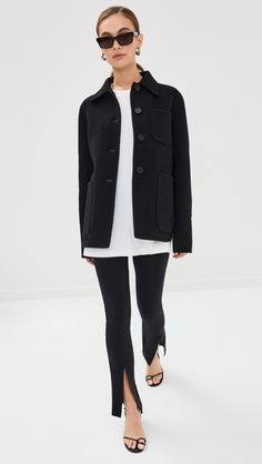 Find JIL SANDER Doubleface Jacket on Editorialist. Fabric: Heavyweight felted wool. Collared neck. Long sleeves with button cuffs. Button placket. Patch breast and hip pockets. Shell: 100% virgin wool. Dry clean. Made in Italy. Measurements: Measurements from size 34 Length: 26.5in / 67.0cm, from shoulder Black Wool Coat With Button Cuffs For Work, Fitted Cashmere Outerwear With Button Cuffs, Chic Cashmere Outerwear With Button Closure, Fall Wool Coat With Button Cuffs For Work, Casual Cashmere Outerwear With Buttons, Black Cashmere Outerwear For Work, Fitted Cashmere Outerwear With Pockets, Work Wool Coat With Buttons, Wool Blazer With Snap Buttons