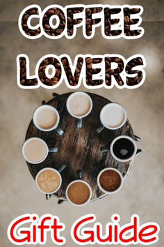 coffee lover's gift guide on the table with cups and saucers in it