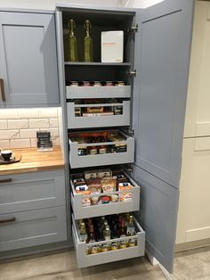 an open pantry with lots of food in it