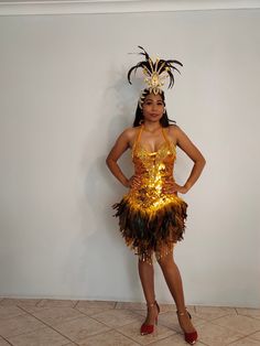 SAMBA FACTORY Lovely shaped handmade Sequin Dress with real Rooster Feathers. Open back, ropes tied at the back.  ( See pictures ) Perfect as a Samba or Dance competition Dress or for Clubbing an a night out ! This listing is for : GOLD color Sequins with GOLD Feather Dress, open back.  ( Please see all pictures ! ) We have many more colors of this gorgeous dresses in stock, please browse in our store ! Dress size : Fits AU/UK Size 8 / 10 / 12 !  Equivalent to US Size 4 / 6 / 8 ! The dress have Gold Fitted Flapper Dress For Costume Party, Gold Party Dress For Festivals, Gold Festival Party Dress, Fitted Gold Festival Dress, Gold Fitted Dress For Festival, Fitted Gold Costume For Costume Party, Glamorous Gold Dress For Festivals, Fitted Gold Dress For Festival, Sequin Feather Dress