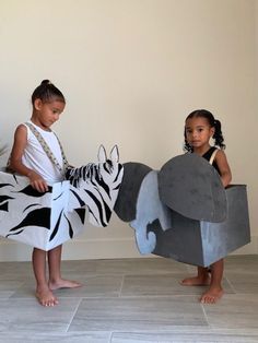 This listing is for two (2) animals a Zebra and Elephant. Turn a cardboard box into your favorite safari animal with this downloadable instructional. This DIY PDF is customizable according to the materials and supplies that you use. The eco-friendly tutorial provides a flexible supply list and encourages recycling, and using items you probably already have at home.    Whether you're looking for a unique halloween costume, or to let your children's imaginations grow while learning about recycling Cardboard Animal Costume, Zebra Diy Costume, Elephant Diy Costume, Safari Dress Up Day At School, Diy Safari Costume, Diy Animal Costume For Kids, Safari Costume Diy, Diy Zebra Costume, Elephant Costume Diy