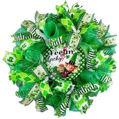 a green and white wreath with the words dream lucky on it