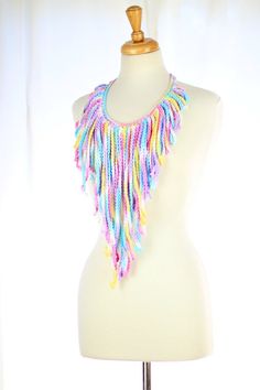 "Handmade crochet fringe necklace in a lovely and magical \"unicorn\" colorway. Unique and eye-catching, you'll love the over-sized, flattering v shape of this crochet piece and the way it catches the breeze as you stroll through Palisades Park...like a bohemian daydream!! It's a very fun and light weight fantasy fashion accessory, with high fashion impact!! ♥One size fits most. ♥Adjustable ties at back neck. ♥100% cotton yarn. ♥Hand wash cold; lay flat to dry. ♥Fringe is approximately 15\" long Multicolor Macrame Necklace For Festivals, Multicolor Fringe Necklace For Festival, Bohemian Crochet Necklace For Party, Bohemian Crochet, Colorful Bohemian, Crochet Fringe, Necklace Colorful, Bohemian Colors, Fringe Necklace