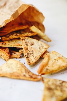 some food is laying on the table and it looks like they have chips in them