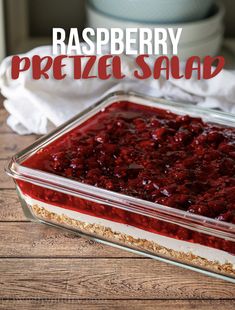 raspberry pretzel salad in a glass casserole dish on a wooden table