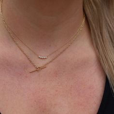 14k gold small hollow square oval link chain necklace with a bar toggle closure at the front 14k small square oval link chain is fixed at 17" chain is approx. 2mm wide bar toggle is approx. 25mm long Toggle Necklace, Link Chain Necklace, A Bar, Chain Link Necklace, Link Chain, Chain Necklace, Bar, Chain, Square