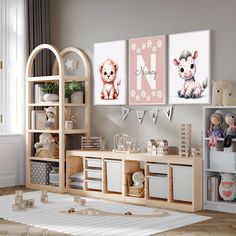 a child's playroom with toys, bookshelves and pictures on the wall