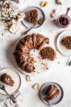 a bundt cake is on a plate with two slices taken out and the rest of the bundt cake has been eaten