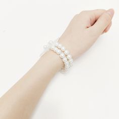 Wholesale price, you could choose the quantity what you need Package: 1 x Wrist Band Made of double-layer artificial pearl bracelet and white plastic base, wear and tear resistant, rust and corrosion resistant Total length: 4.3" Total Width: 2.3" Other decorations not included 3 styles to choose Uses: Wedding, Party, Event, Banquet, Decoration. White Bangle Stretch Bracelet For Wedding, White Pearl Bracelet With Extender For Wedding, White Pearl Wedding Bracelet With Extender, Adjustable Pearl Bracelet With Extender, White Bangle Bracelet With Pearl Charm, Adjustable White Pearl Bracelets, Adjustable White Round Pearl Bracelet, White Pearl Stretch Bracelet With Pearl Charm, Adjustable White Stretch Bracelet For Party