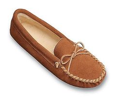 He'll rejoice when he slips his feet into these traditional moccasin slippers from Minnetonka. A cozy pile lining makes the soft-sole shoes perfect for chilly mornings or evenings.    Men's whole sizes 7 thru 13.    100% suede leather with pile lining.    Made in Dominican Republic. Comfortable Slip-on Winter Moccasins, Comfortable Brown Moccasins, Comfortable Moccasins With Round Toe, Comfortable Brown Winter Moccasins, Comfortable Winter Slip-on Moccasins, Moccasin Slippers, Suede Slippers, Moccasins Slippers, Sleepwear & Loungewear