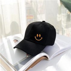 The Smiley Face Embroidered Summer Unisex Hat Baseball Cap is designed to bring a smile to anyone's face. Featuring a fun and lighthearted smiley face embroidery, this cap is perfect for anyone who wants to add a touch of playfulness to their outfit. The cap is also available in a variety of bright and vibrant colors, making it a great accessory for the summer season. APPROPRIATE FOR ANY OCCASSION: Our smile baseball cap are perfect for bad hair days ,also suitable for casual daily wear, you can Smiley Face Embroidery, Feel Happy, Hat Baseball, Smiling Face, New Era Cap, Face Design, Bad Hair Day, Bad Hair, Smile Face