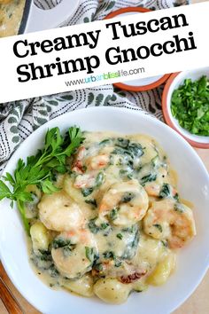 creamy tuscan shrimp gnocchini with spinach and parsley in a white bowl