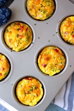 several muffins in a pan on a table