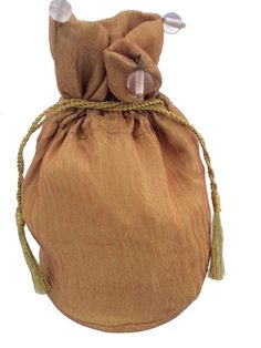 a small brown bag with rope handles