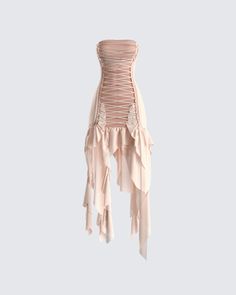 a pink dress with ruffles on the bottom and side, hanging from a string