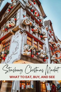 a tall building with teddy bears on it and the words stay - at - christmas market what to eat, buy and see