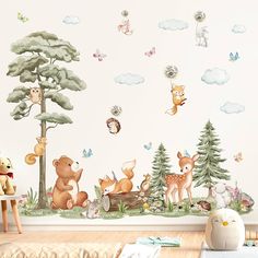 a wall with many animals and trees on it