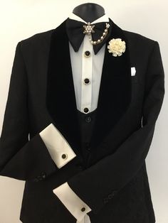 Our 3 piece black tuxedo, the latest addition to our family of wedding and special event attire, will make heads turn. This 3 piece tux includes a bow tie, boutonnière, button covers, and cufflink sets of your choice. Fancy Tuxedo For Men, Bow Tie Outfits Men, Event Attire, Tuxedo Bow Tie, Mens Wedding Suits, Black Tux, Button Covers, Black Tuxedo, Tuxedo For Men