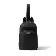 a black backpack sitting on top of a white surface