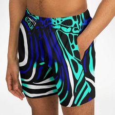 Dive into summer with confidence and style in our Maris Equi Men's Angelfish Swim Shorts. Crafted for both comfort and performance, these swim trunks are the perfect companion for your beach adventures. Pair them with our matching shirts, flip flops, and swim briefs for a coordinated look that's sure to turn heads. Explore our collection now and make a splash this season! These swim trunks are handmade after you order them. Please allow 2 weeks for delivery. This suit has a lot of stretch and is Fish Man, Mens Swim Shorts, Swim Brief, Beach Adventure, Angel Fish, Mens Swim Trunks, Man Swimming, Drawstring Waistband, Above The Knee