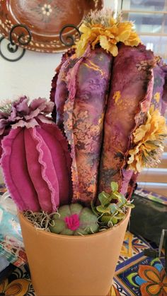 a potted plant sitting on top of a table