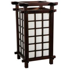 This elegant table lamp evokes images of the far East while lighting a room with its soft, warm glow. Constructed from authentic washi rice paper set within a Japanese style wooden frame, it makes a stylish accent in the modern home. Size: 6 Panels. Color: Dark Walnut. Japanese Lamp, Japanese Lamps, Japanese Table, Elegant Table Lamp, Japanese Furniture, Asian Homes, Lantern Design, Red Lantern, Asian Design