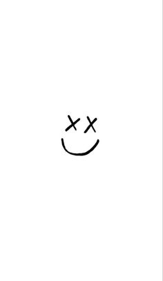 a black and white drawing of a smiley face