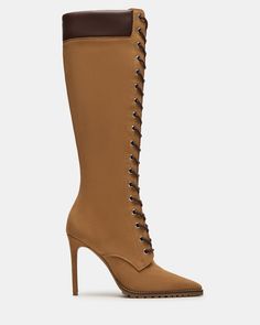 Elevate your style with our UTILITY boots. These boots showcase a sleek, sophisticated look with a knee-high design and pointed toe. The stiletto heel adds height and the lace-up design allows for a snug fit. These boots are perfect for any occasion. 4 inch heel height Size 6 measurements: 13.75 inch shaft circumference, 15 inch shaft height Size 8 measurements: 14.75 inch shaft circumference, 16 inch shaft height Size 10 measurements: 15.75 inch shaft circumference, 17 inch shaft height Leather Trendy Fitted Lace-up Boots With Reinforced Heel, Elegant Lace-up Platform Boots With Reinforced Heel, Fitted Brown Lace-up Knee-high Boots, Trendy Fitted Lace-up Boots, Chic Knee-high Lace-up Boots For Fall, Trendy Fitted Leather Lace-up Boots, Fitted Lace-up Platform Boots For Fall, Winter Workwear Lace-up Boots With Pointed Toe, Trendy Fitted Knee-high Lace-up Boots