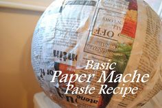 a paper mache is sitting on top of a white box with the words, basic paper mache paste recipe