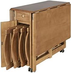 an image of a kitchen cart with cutting boards