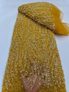 This high quality Fabric is measured in 5 Yards With Embroidered Beading and Sequin. It is soft, very delicate and beautiful. This high Quality Fabric is made with Fashion embroidered rhinestones can be used in making party wedding dresses, skirts, shawls, scarves and other other fashion apparels as you would like. Size : Length : 5 yards (180 inch). Width: 50 inch (Please allow slight deviation for the measurement data ,±1 inch) Material: 100% Polyester, Tulle Lace Fabric, Eco-Friendly embroidery Sewing Wedding Dress, Beading Netting, Beaded Lace Fabric, Nigerian Lace, Nigerian Wedding, African Beads, Sequin Fabric, Sequin Beading, Tulle Fabric