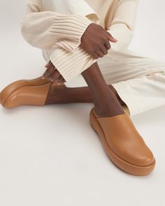 The Puffa Flatform Desert Tan – Everlane Casual Platform Slippers With Textured Sole And Round Toe, Casual Platform Slippers With Textured Sole, Slip-on Clogs With Stitched Sole And Closed Toe, Modern Slip-on Clogs With Stitched Sole, Leather Slip-on Clogs With Removable Insole, Comfortable Platform Slippers With Removable Insole And Round Toe, Leather Clogs With Stitched Sole And Closed Toe, Everyday Leather Sole Clogs, Casual Brown Leather Platform Slippers