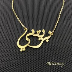 "Our Cutoff Date for Christmas delivery is Sunday Dec. 13, 2020 All Order placed after this date will be completed for mid January delivery. Orders submitted by December 18, 2017 will receive FREE SHIPPING UPGRADE for a Christmas Delivery Gold Arabic Name necklace personalized App 1.5\" wide and about 1mm thick, made of solid 14kt. Yellow gold. The necklace suspends from a cable Link chain with 3 choices of length: 14\",16\" and 18\". The necklace can be made with the name of your choice. Please Customized Gold Name Necklace With Round Pendant, Custom Gold Necklace With Names For Wedding, Customized Gold Name Necklace For Wedding, Custom Gold Wedding Necklace With Names, Custom Name Pendant Necklace, Gold Name Necklace For Wedding, Gold Pendant Necklace With Names, Gold Pendant Necklaces With Names, Gold Nameplate Jewelry With Names