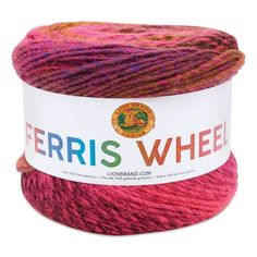 a ball of yarn with the words ferris's wheel on it in red and pink