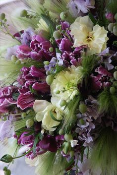 a bouquet of purple and white flowers