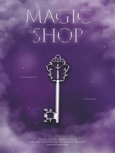 the magic shop book cover with a key in the middle and purple clouds behind it