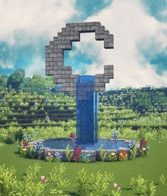 an image of the letter c made out of bricks in a garden with flowers and bushes