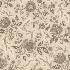 a beige and brown floral pattern on fabric