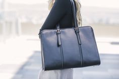 This functional and elegant leather laptop bag is a reliable companion to a woman on-the-go, whether she's working, traveling, or commuting. Laptop Bags For Women, Full Grain Leather Bag, Fancy Stuff, Briefcase Women, Laptop Bag For Women, Luggage Strap, Minimalist Bag, Industrial Hardware, Office Bag