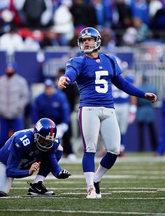 a football player throwing a ball during a game