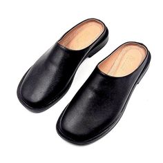 Materials: 100% Genuine Leather Sole: Comfort-contoured Heel: Flat Fit: Snug  Size Chart: For sizing information, please see the size chart included in the picture gallery or use online shoes size converter https://www.gigacalculator.com/converters/shoe-size-converter.php Elevate your style with these sleek Leather Mules for Women: Flat Shoes for Women, Gift for Women  The modern square-toe design adds a touch of sophistication, while the smooth leather construction ensures comfort and quality.  These versatile flats are perfect for dressing up or down, making them a must-have for any wardrobe.  Walk confidently in style with these black leather mules! Black Leather Slip-on Mules, Black Closed Toe Slip-ons With Leather Footbed, Faux Leather Slip-on Mules With Leather Footbed, Classic Slip-on Mules With Round Toe, Slip-on Mules With Round Toe For Business, Business Clogs With Leather Footbed And Round Toe, Business Slip-on Mules With Round Toe, Casual Slip-on Mules For Business, Casual Business Mules