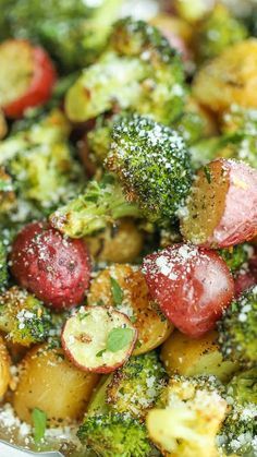 broccoli, potatoes and other vegetables covered in powdered sugar on a plate