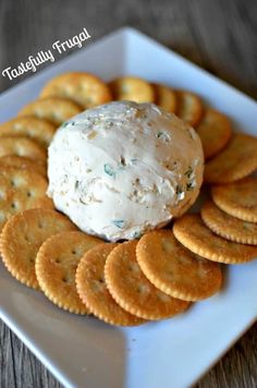 a plate with crackers and a scoop of ice cream on top