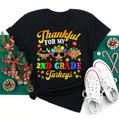 Buy Thankful For My 2nd Grade Turkeys Thanksgiving Teacher Shirt at Fantasywears. Hight quality products with perfect design is available in a spectrum of colors and sizes, and many different types of shirts! Unisex T-Shirt – 100% Cotton (fiber content may vary for different colors) – Medium fabric (5.3 oz/yd² (180 g/m²)) – Classic fit – Tear away the label – Runs true to size Women T-Shirt – 100% combed ringspun cotton (fiber content may vary for different colors) – Light fabric (4.3 oz/yd² (146 g/m²)) – Slim fit with a longer body length – Tear away the label – [...] Cute Thanksgiving Teacher Shirts, Thanksgiving Tshirts For Teachers, Little Turkey Shirt, Little Turkey Thanksgiving Shirt, Cotton Crew Neck T-shirt For Thanksgiving, Photographer Shirts, Mechanic Shirts, Thanksgiving Shirt, Beer Shirts