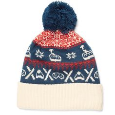 a blue and red knitted hat with an ugly pattern on the front, white background