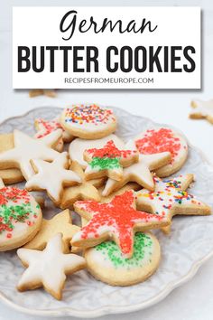 german butter cookies on a plate with sprinkles and red white and green stars