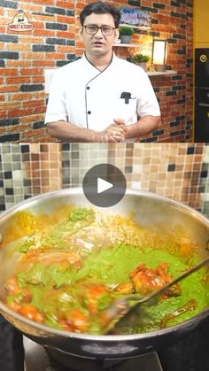 a man standing in front of a pan filled with food