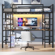 a loft bed with a desk underneath it and pictures hanging on the wall above it