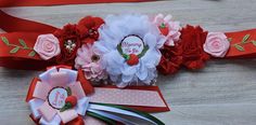 two red and white flowers on top of each other with ribbons around the edges that say happy valentine's day