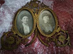 an old photo of two women in ornate gold frames on a red and white background